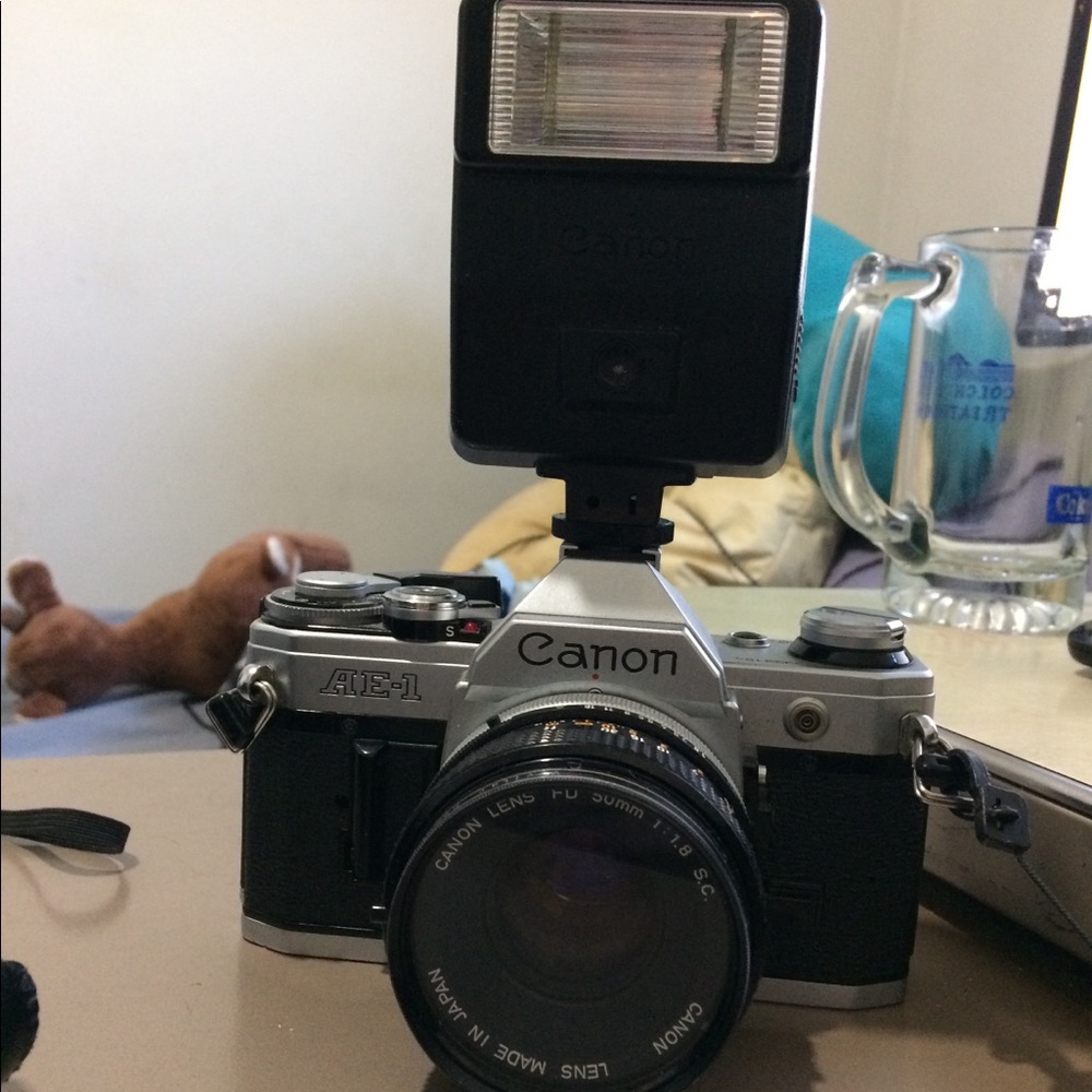 Canon AE-1 manual 35mm camera + Bag w/ lenses